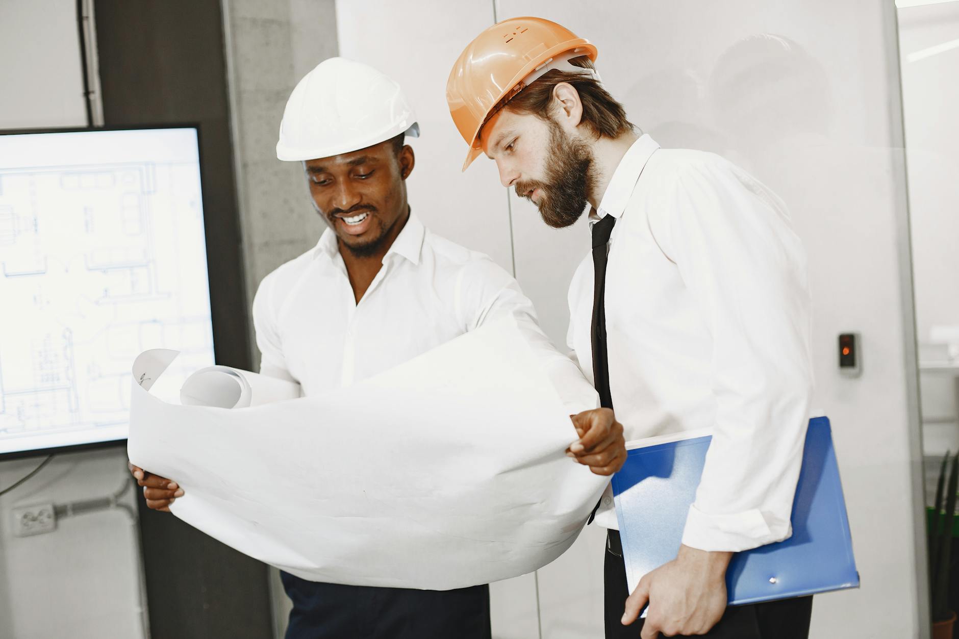 Construction team reviewing plans