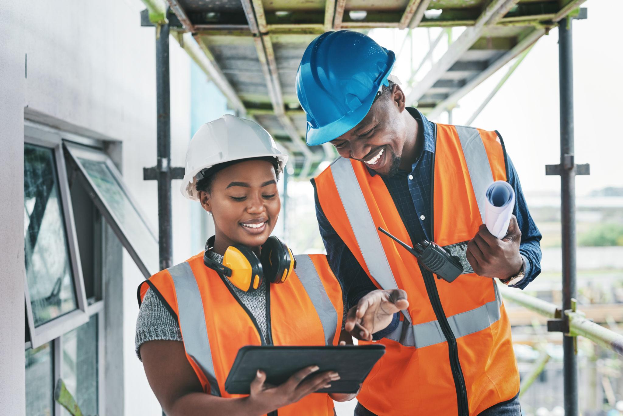 Construction workers collaborating